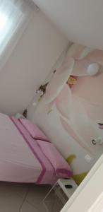 A bed or beds in a room at Kimberly House
