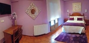 Postel nebo postele na pokoji v ubytování Hostal Mizmaya