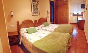 Cama o camas de una habitación en Hostal Mizmaya