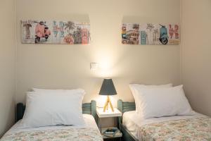 Postel nebo postele na pokoji v ubytování Casa di Colona - Μπλε