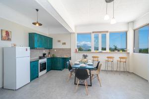 Kuchyň nebo kuchyňský kout v ubytování Casa di Colona - Μπλε