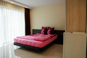 Postel nebo postele na pokoji v ubytování Zafo Hotel