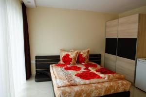 Postel nebo postele na pokoji v ubytování Zafo Hotel