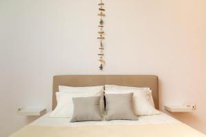 Ένα ή περισσότερα κρεβάτια σε δωμάτιο στο Naxos Almyra Apartment 19