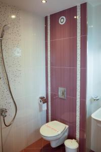 Koupelna v ubytování Zafo Hotel
