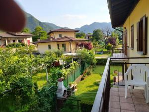 a balcony with a view of a garden at Alex's home 2 in Crone