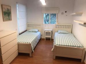 Posteľ alebo postele v izbe v ubytovaní Chalet con Piscina - LAS ADELFAS