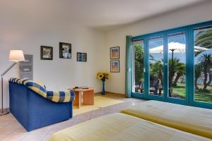 Postel nebo postele na pokoji v ubytování Apartments Villa Ana