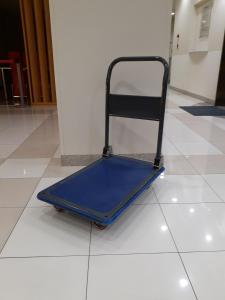 
a blue skateboard sitting on top of a tile floor at Best Western Yamagata-airport in Higashine
