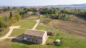 an aerial view of a house in a field at Tenuta La Santissima in San Rocco a Pilli