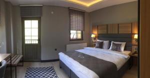 Ein Bett oder Betten in einem Zimmer der Unterkunft Kaya Life Resort