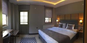 Ein Bett oder Betten in einem Zimmer der Unterkunft Kaya Life Resort