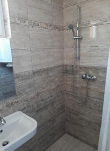Kúpeľňa v ubytovaní Fortuna Apartmanházak