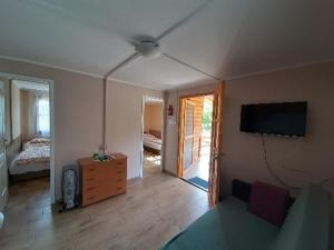 Posteľ alebo postele v izbe v ubytovaní Fortuna Apartmanházak
