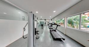 a hospital hallway with treadmills and machines in it at Amazon Plaza Hotel in Cuiabá
