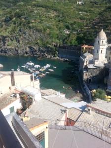 a view of a river with boats in the water at Affittacamere Benedetta e Isabelle in Vernazza
