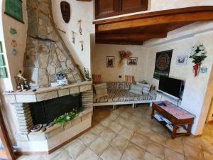 an overhead view of a living room with a fireplace at Casa Sole in Villasimius
