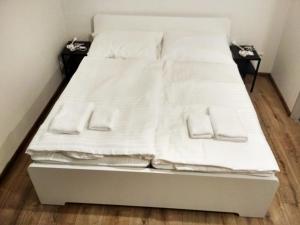 Postel nebo postele na pokoji v ubytování Meštiansky dom Sládkovič, centrum Banskej Štiavnice