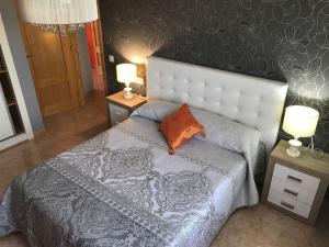 Posteľ alebo postele v izbe v ubytovaní VILLA MIRAMAR