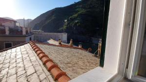 a view from a window of a roof at Affittacamere Benedetta e Isabelle in Vernazza