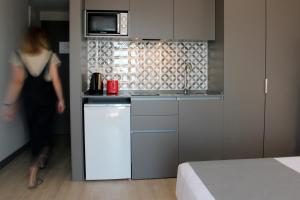 Kuchyň nebo kuchyňský kout v ubytování Apartamentos Ribera