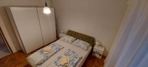 Postel nebo postele na pokoji v ubytování Apartment Grubišić