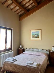 A bed or beds in a room at Fontebella Még 37 kép