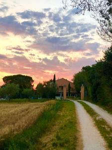 The sunrise or sunset as seen from a panziókat or nearby
