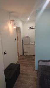 Łóżko lub łóżka w pokoju w obiekcie Bastówka Apartamenty