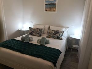 Кровать или кровати в номере Harrys Palm Puerto de Mogán