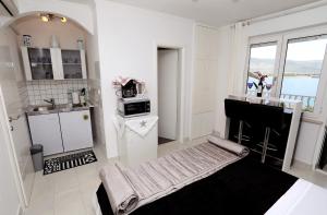 Kuchyňa alebo kuchynka v ubytovaní Apartments ITD