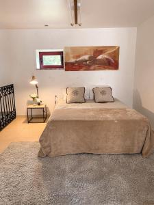 Posteľ alebo postele v izbe v ubytovaní quarto familiar zona guimaraes