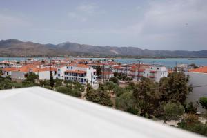 a view of a city with a body of water at Berdoussis Hotel in Elafonisos