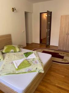 Postel nebo postele na pokoji v ubytování Casa Teodora