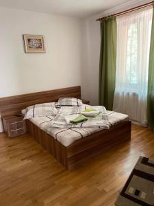 Postel nebo postele na pokoji v ubytování Casa Teodora