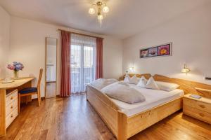Postel nebo postele na pokoji v ubytování Hotel Stefanie