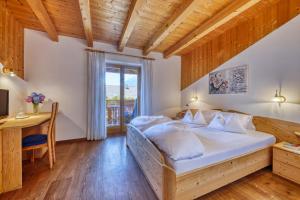 Postel nebo postele na pokoji v ubytování Hotel Stefanie