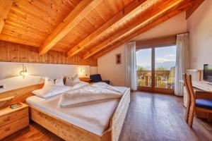 Postel nebo postele na pokoji v ubytování Hotel Stefanie