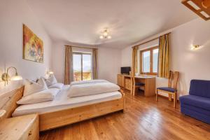 Postel nebo postele na pokoji v ubytování Hotel Stefanie