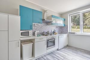 Eldhús eða eldhúskrókur á Gejzir Apart +7 myndir