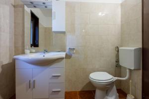 Kúpeľňa v ubytovaní Apartments DESA