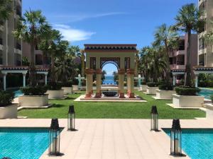 a gazebo at a resort with a pool at หัวหิน มาราเกซ คอนโด Marrakesh Hua Hin condo in Hua Hin