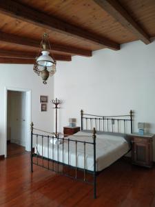En eller flere senger på et rom på Liknon Guesthouse Villa