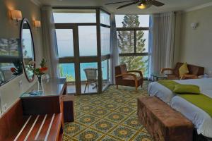 Postel nebo postele na pokoji v ubytování Ron Beach Hotel + 29 fotografií