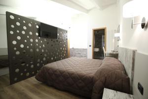 Voodi või voodid majutusasutuse Albergo Antica Locanda toas +37 fotot