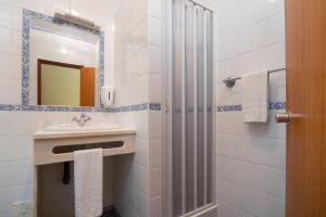 Koupelna v ubytování Residencial Capri by Umbral