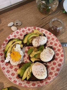 a plate of eggs and bananas on a table at Kuchonka in Chornomorsk