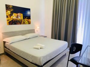 Katil atau katil-katil dalam bilik di InCentroScalea B&B