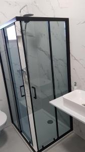 Kúpeľňa v ubytovaní Kabashi Apartment + 30 fotografií