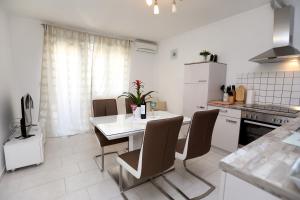 Kuchyňa alebo kuchynka v ubytovaní Apartments ITD